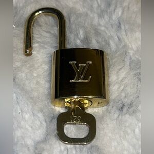 Louis Vuitton Brass Padlock and Key set, No. 321